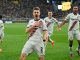 Leverkusen stay unbeaten with last-gasp strike at Dortmund