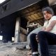 a palestinian girl sits in front of her house after israeli settlers attacked the village of al mughayyer in the israeli occupied west bank april 17 2024 photo reuters